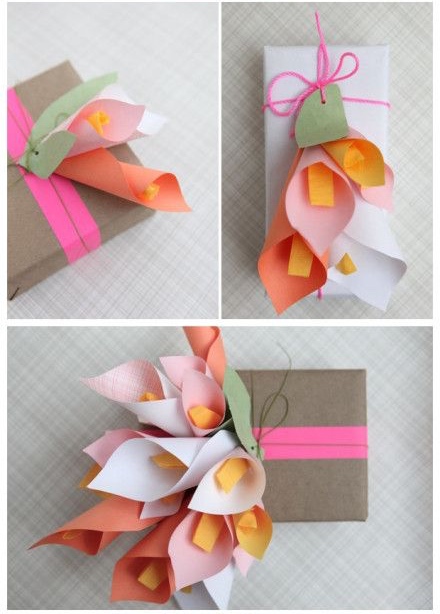 handcrafted lillies on top of gift wrapped packages