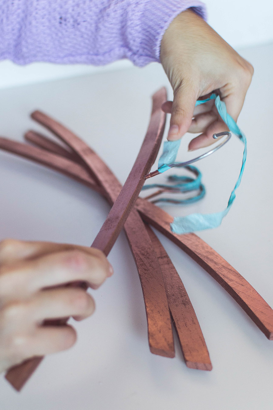 DIY rose gold hangers: remove the washi tape