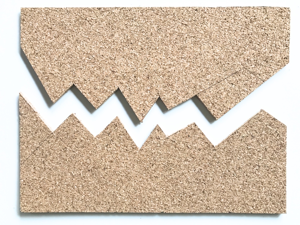 cut the cork board with zig zag shapes