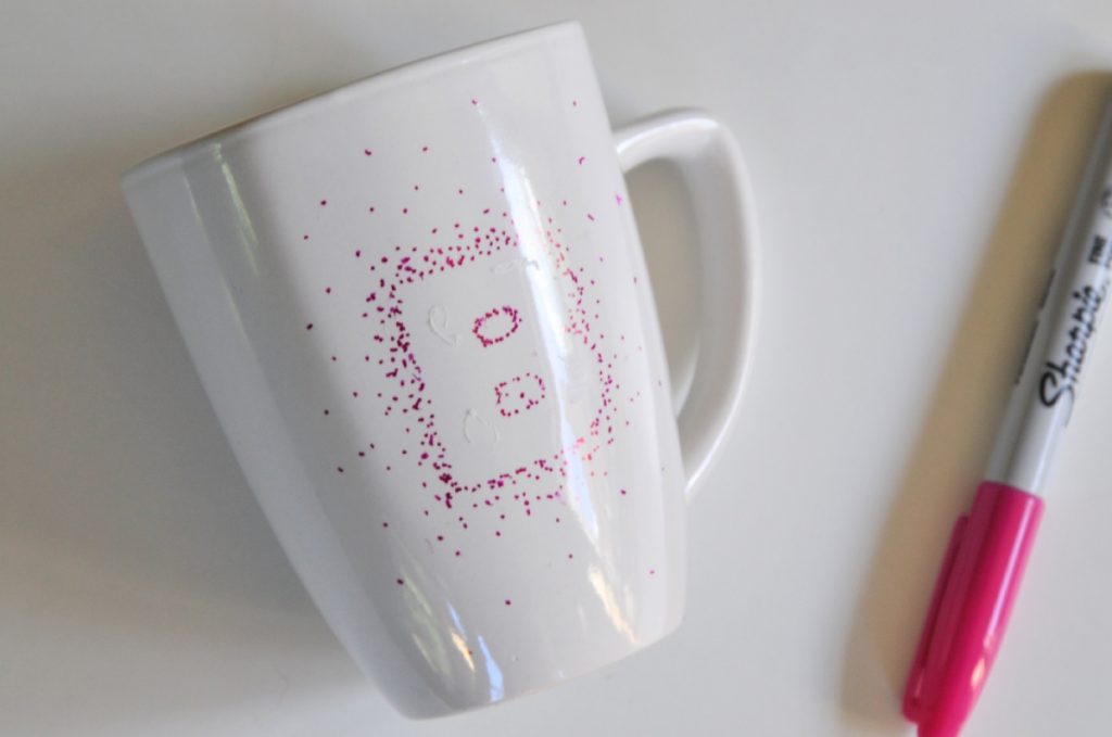 finished stippling dots effect on coffee mug