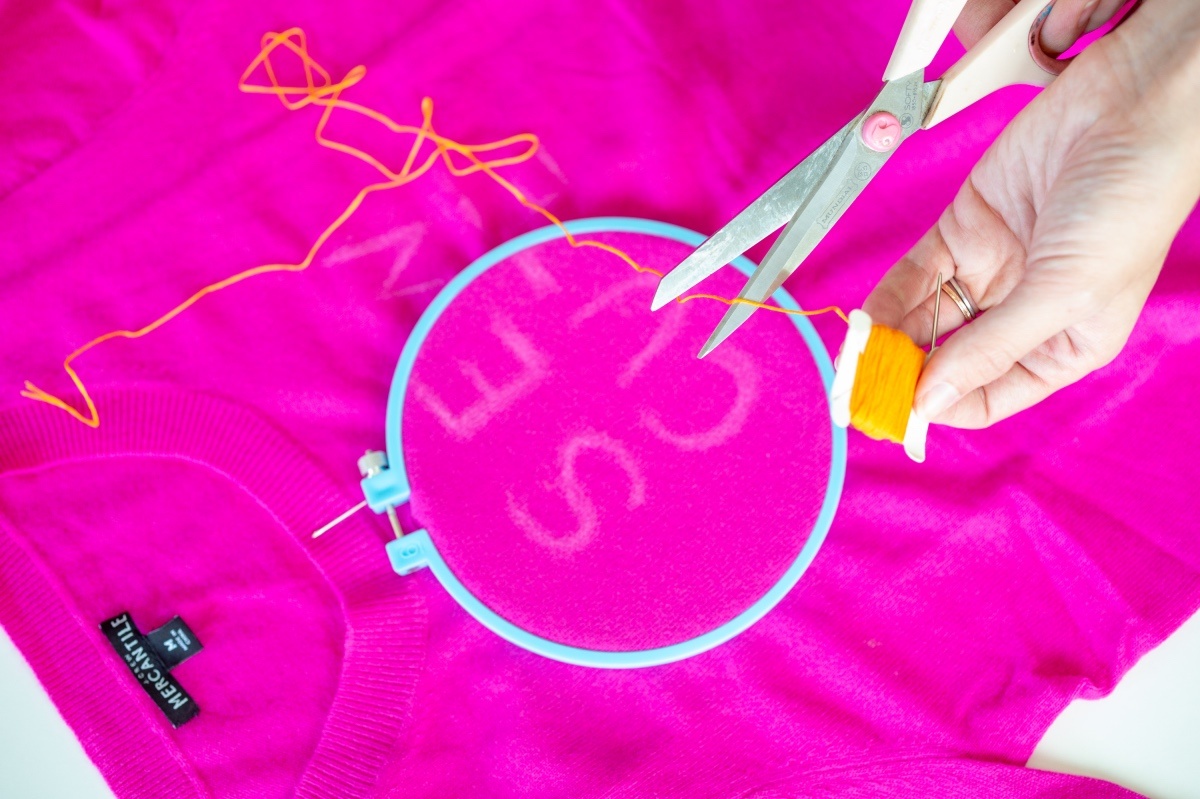 cut the embroidery floss to make a diy sew crafty sweater