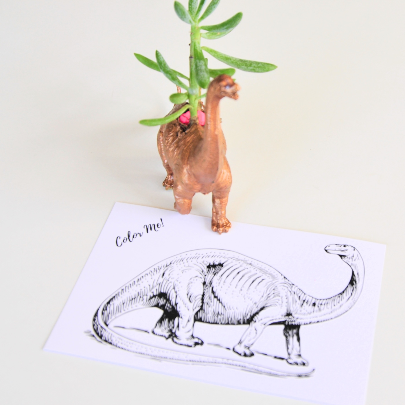 gilded dinosaur with free brontosaurus coloring postcard pop shop america