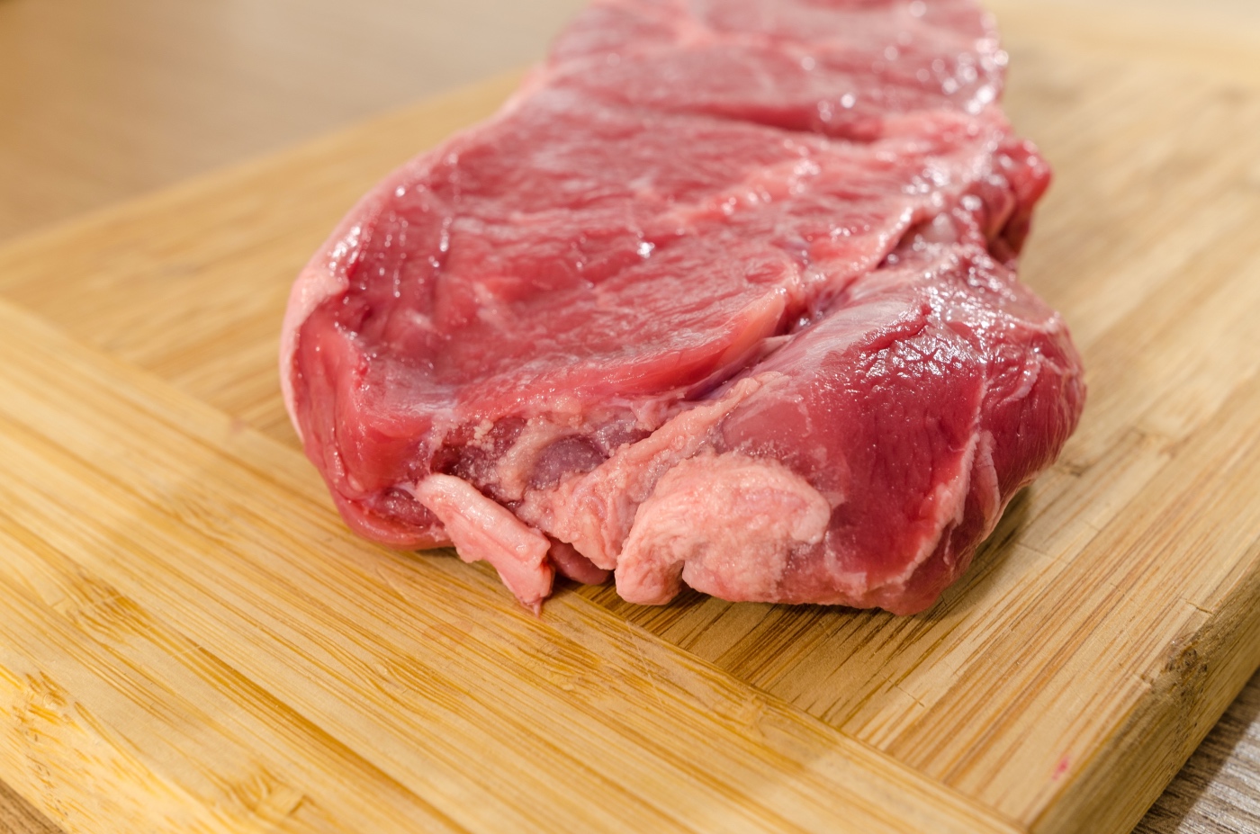 raw steak before simple garlic steak marinade is added pop shop america