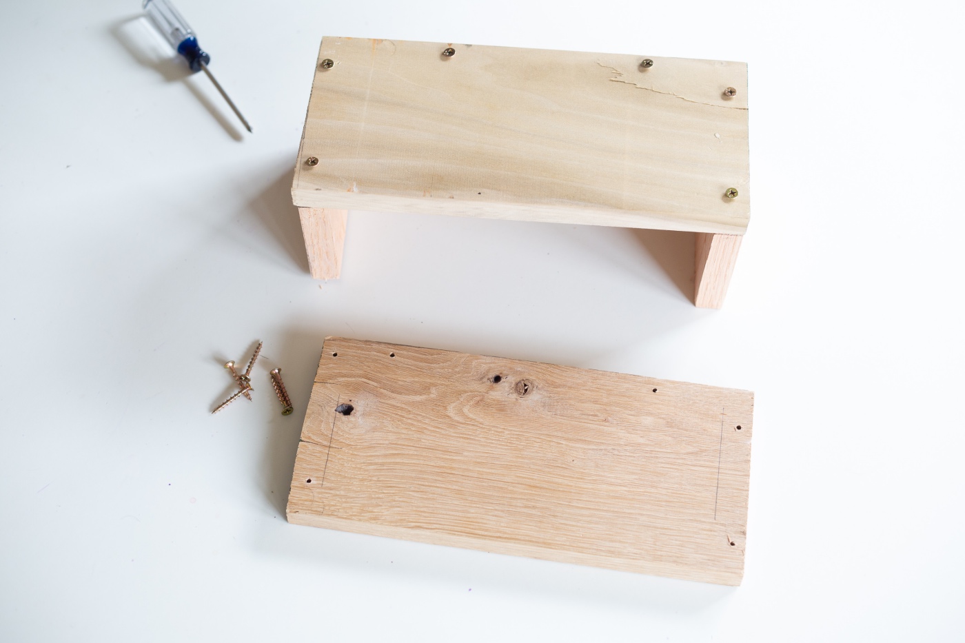 sides of wood window planter box with screws pop shop america gardening craft tutorial