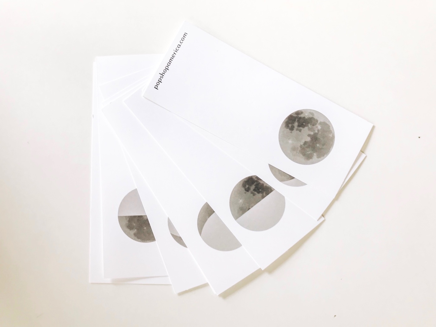 how-to-attach-the-moon-phase-flip-book-pop-shop-america_bright