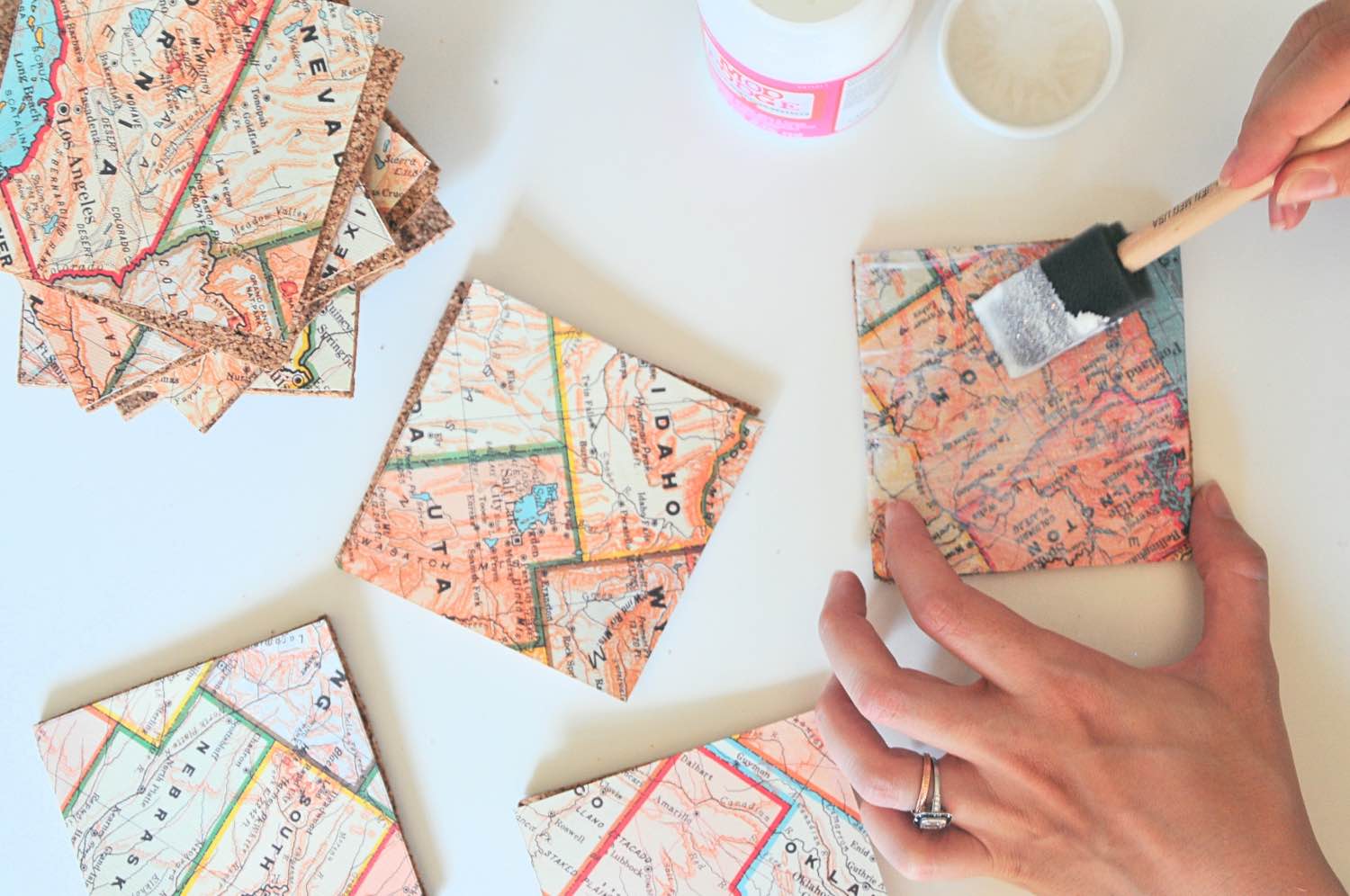 add mod podge to the map diy map coasters tutorial