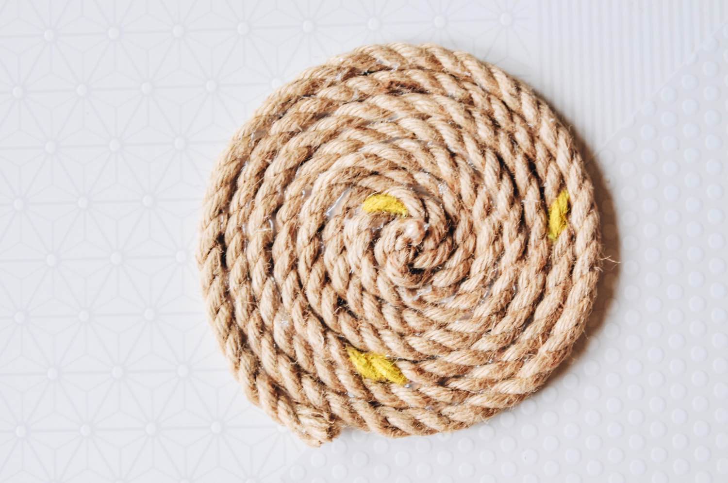 add yellow paint to the diy rope trivet pop shop america