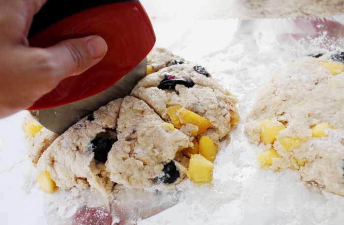 cut dough into 8 triangles for peach blueberry scones