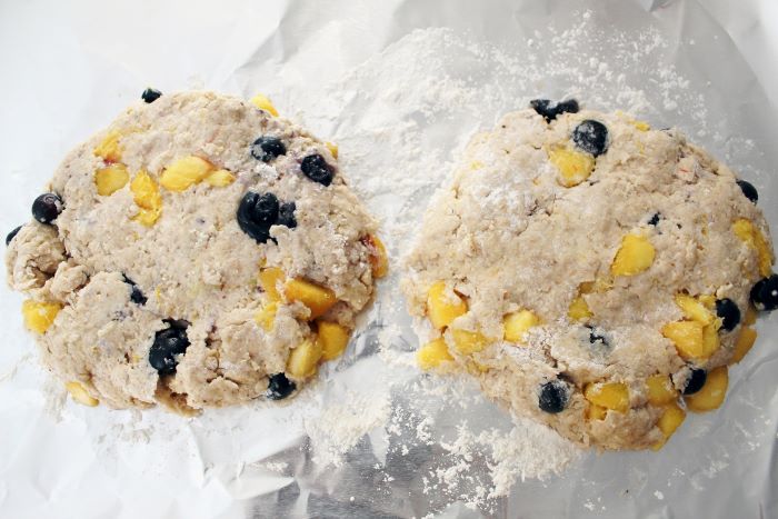 blueberry peach scone dough shaped into rounds