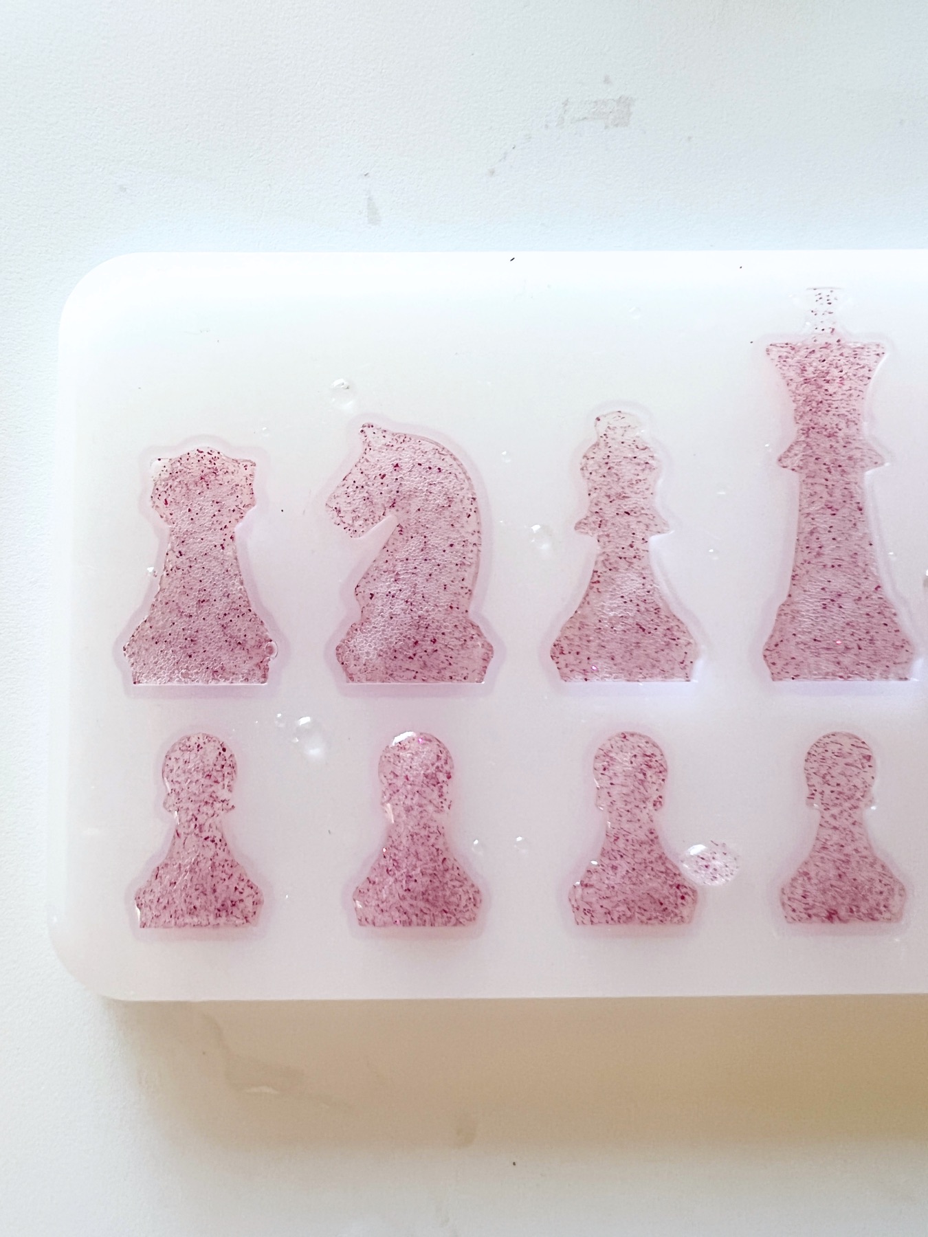 glitter resin in the chess piece molds