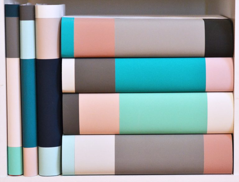 How To Curate Your Bookshelf With DIY Dust Jackets
