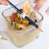 add-extra-dried-flowers-to-the-top-of-the-diy-terrarium-candle_small_square