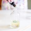 adding-essential-oils-to-the-reed-diffuser-pop-shop-america_square