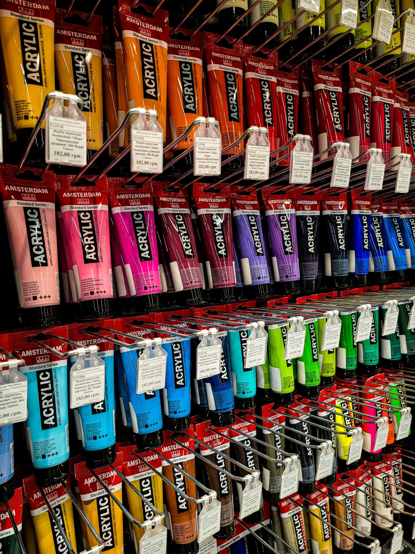 acrylic paint on the shelves in a variety of color