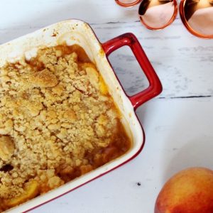 Angled-Peach-Vanilla-Bourbon-Crumble-with-Peach-and-Spoons_square