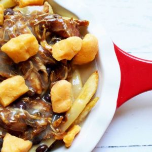 half-view-ceramic-skillet-with-bbq-chicken-black-bean-poutine_square