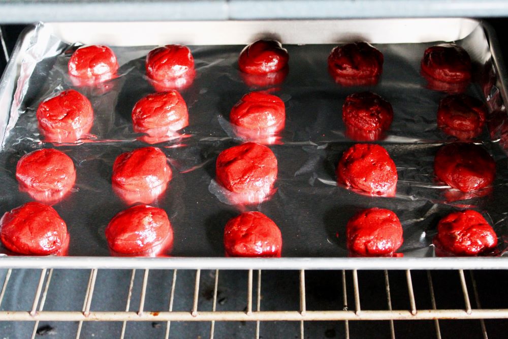 cookie dough in oven to make red velvet cookies 1