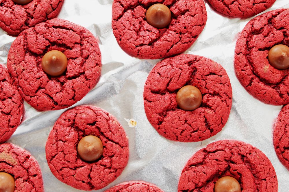 red velvet cherry kiss cookies on baking sheet 1