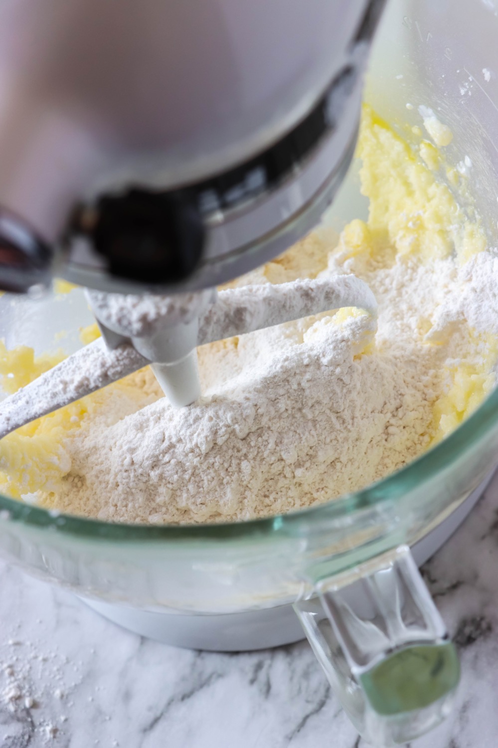vanilla cupcake batter in a kitchen-aid mixer