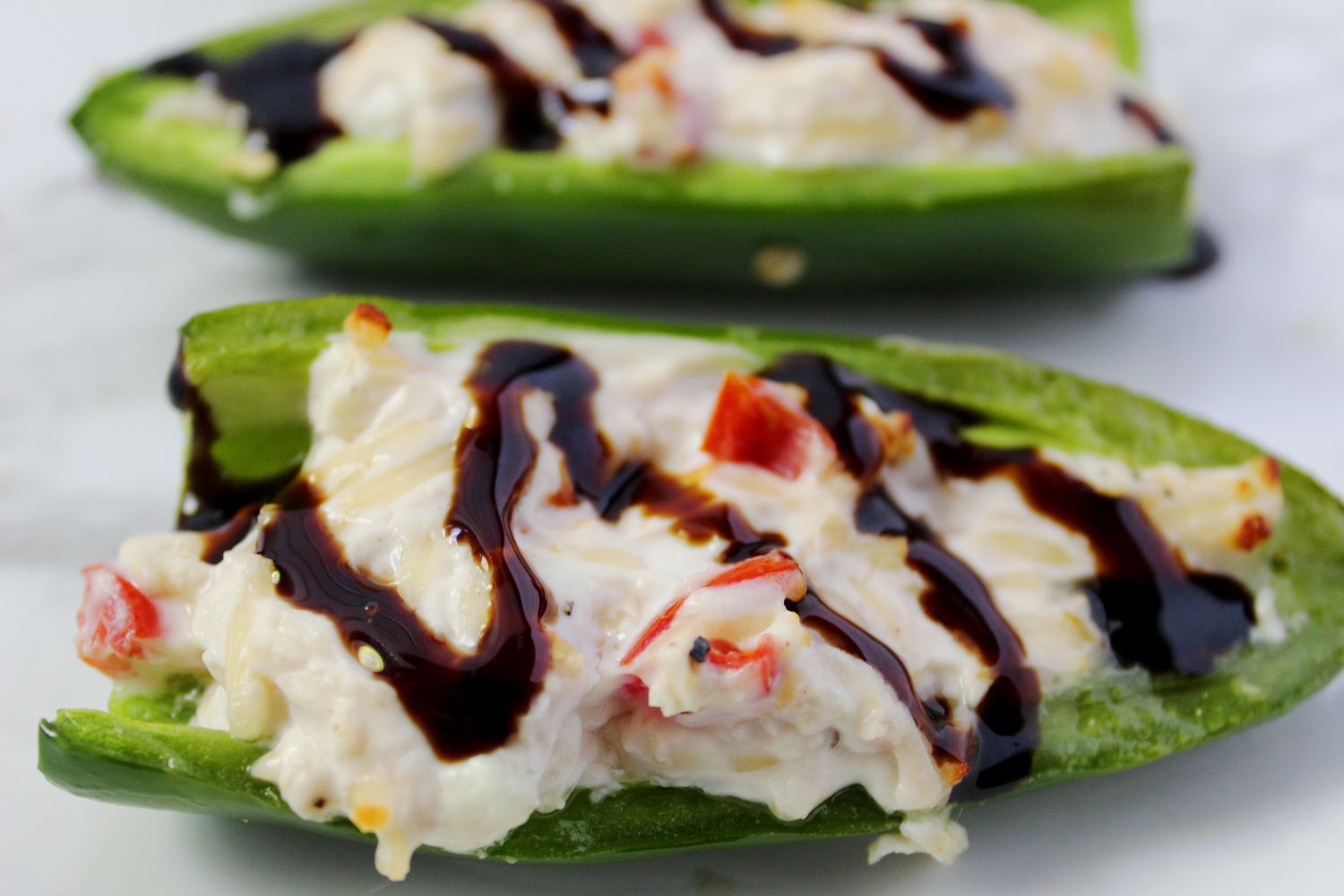 closeup of goat cheese air fryer stuffed jalapeno 1