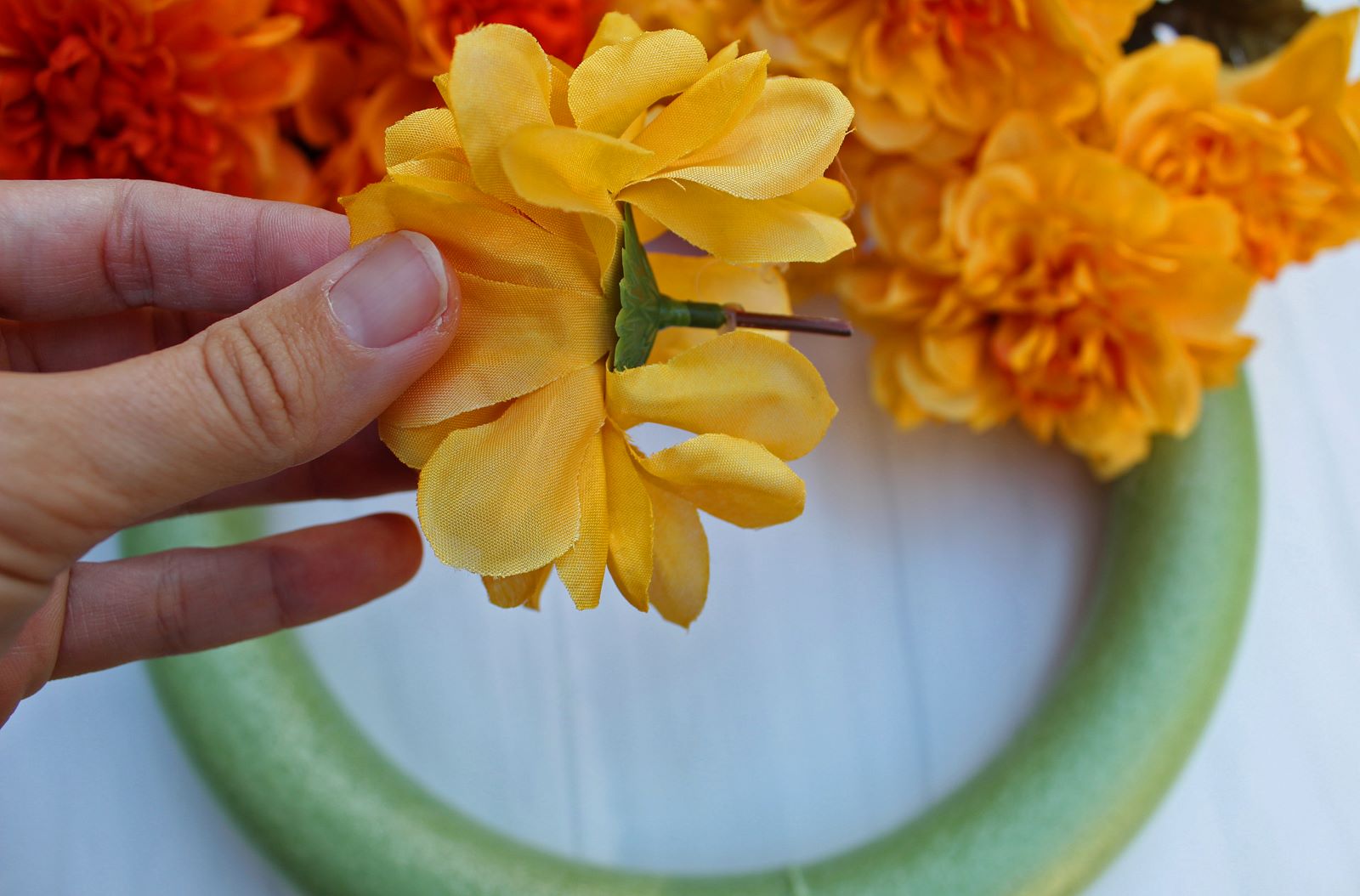 cut floral stems to stick in diy wreath 1