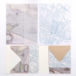 flatlay of map stationery paper set