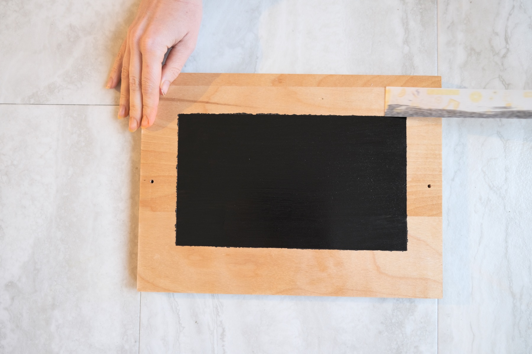 craft tutorial for chalkboard paint tray with tape removed