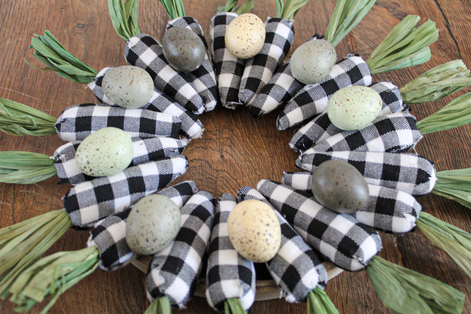 Flat view of black and white plaid easter carrot wreath 1