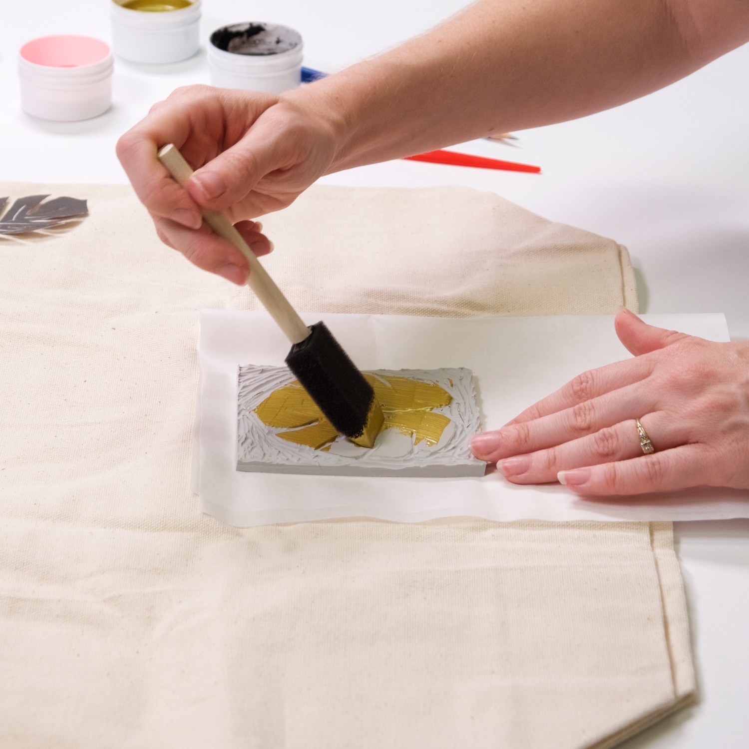 coat the linocut block with fabric paint craft tutorial