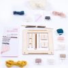 flatlay of all the supplies inside diy loom weaving FULL kit