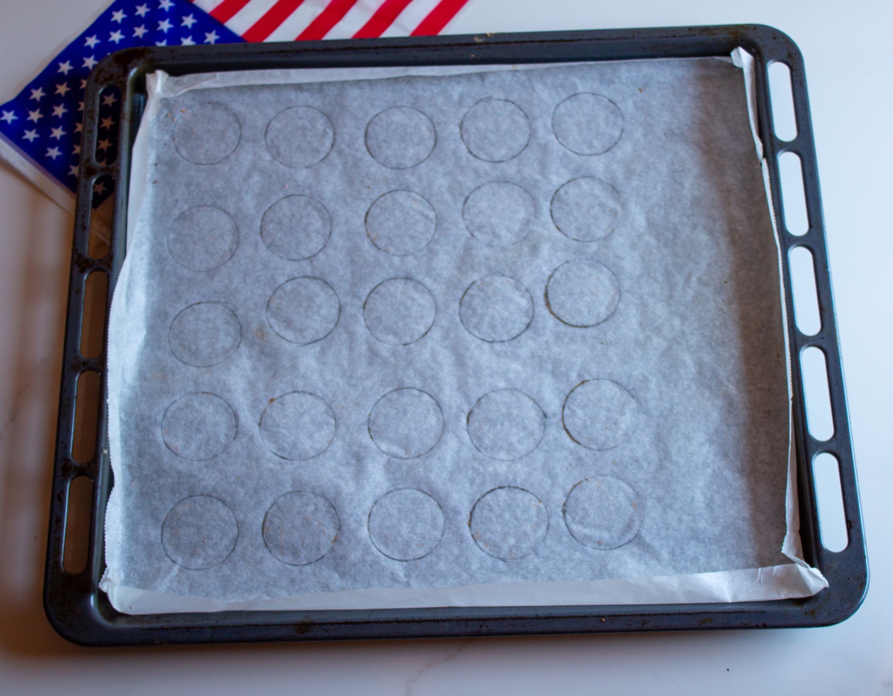 mark the cookie sheet for size and placement of macarons