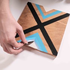 removing the last of the tape diy chevron painting tutorial square
