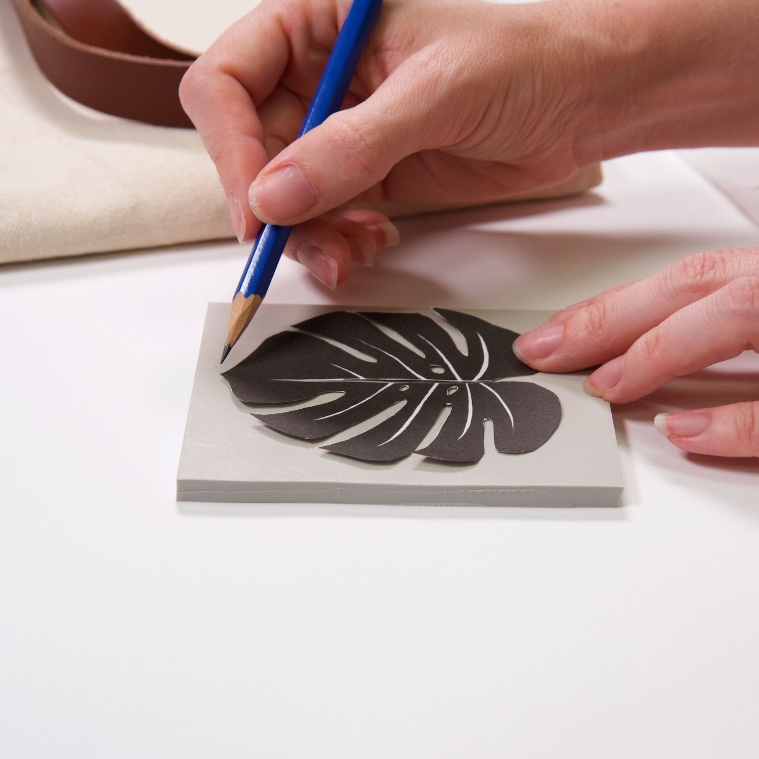 trace the outside of the template to make a linocut