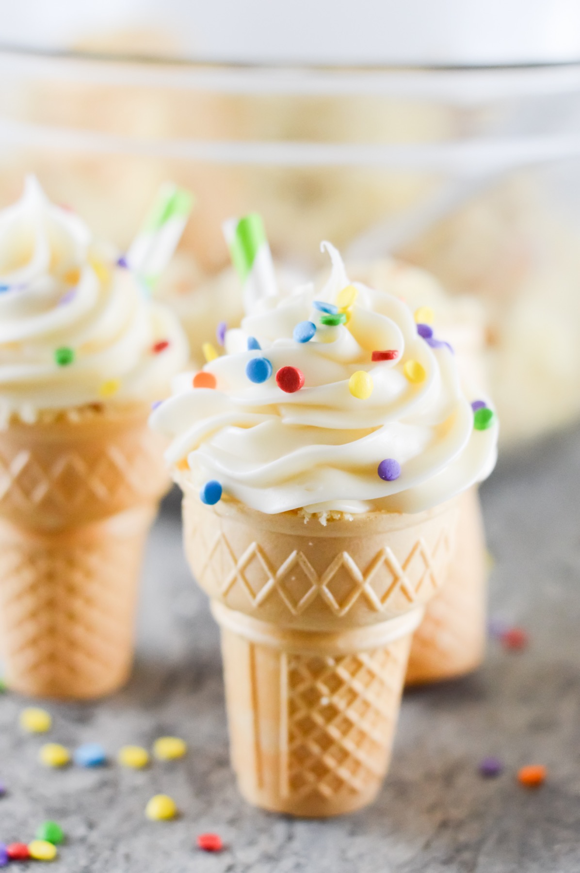 https://popshopamerica.com/wp-content/uploads/2021/06/close-up-of-finished-cupcakes-recipe-in-an-ice-cream-cone.jpg