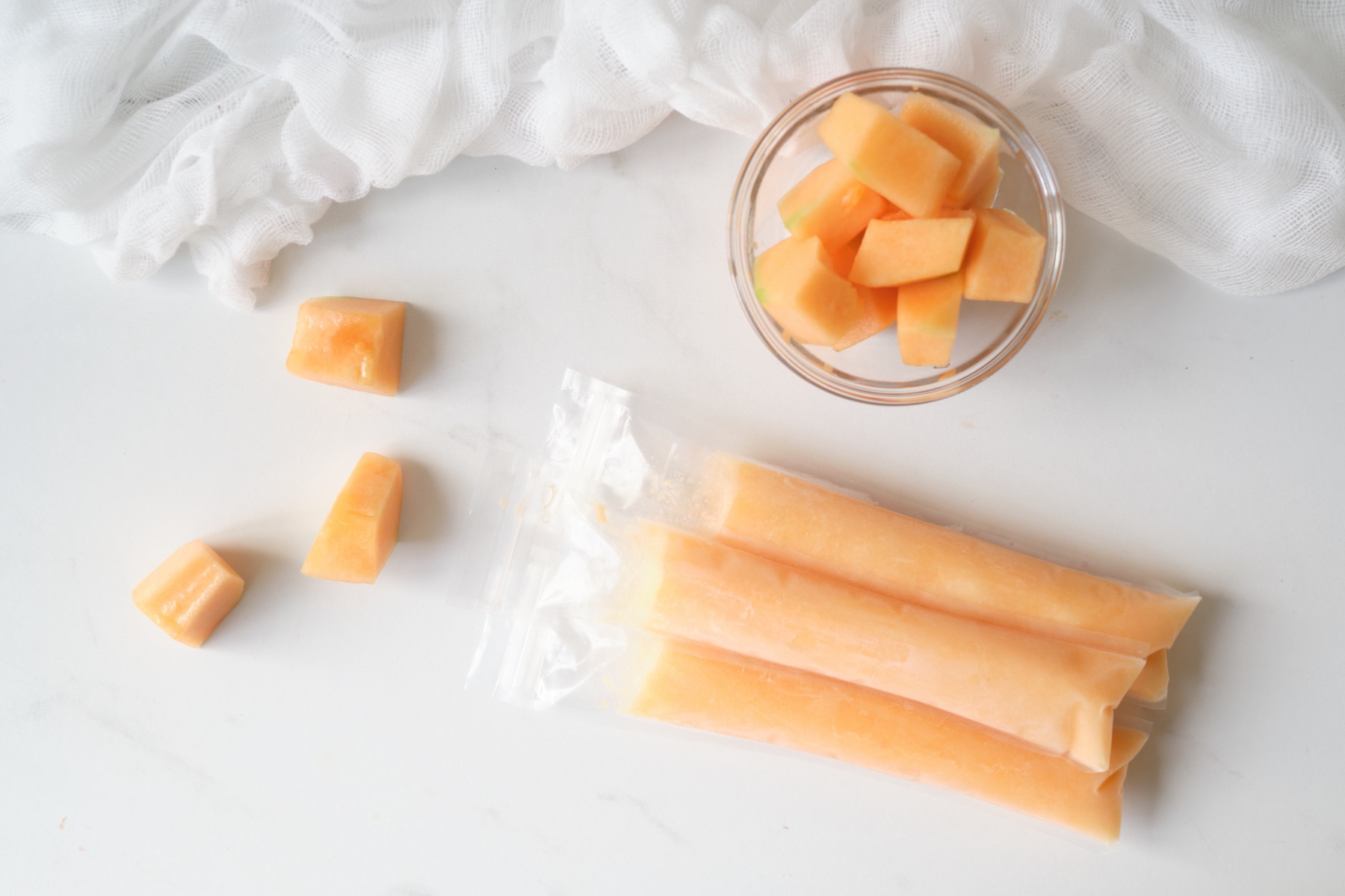 https://popshopamerica.com/wp-content/uploads/2021/07/cantaloupe-freezer-pops-recipe-tutorial.jpg