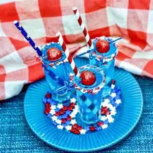 finished cocktail shooters with calypso blue ocean lemonade square