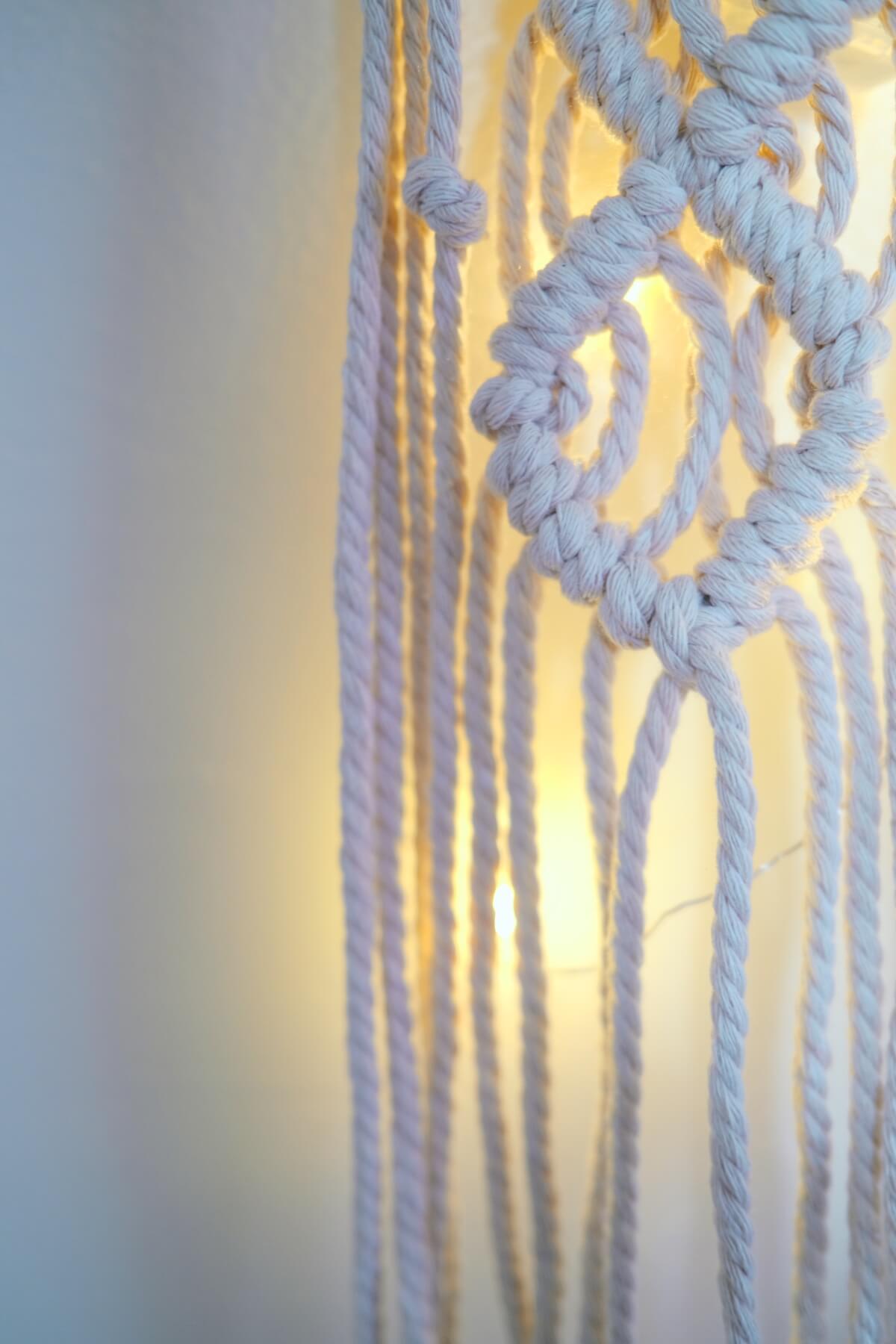 detail of the finished light up macrame wall hanging