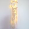 finished macrame moon wall hanging tutorial