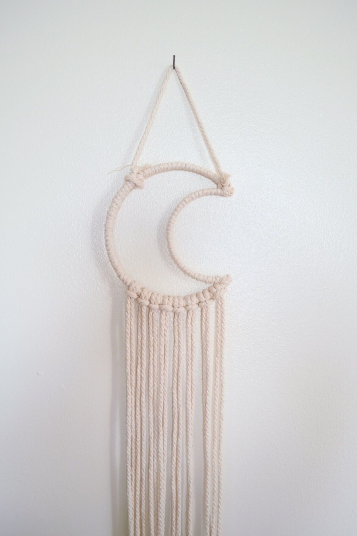 hang your macrame wall hanging on the wall