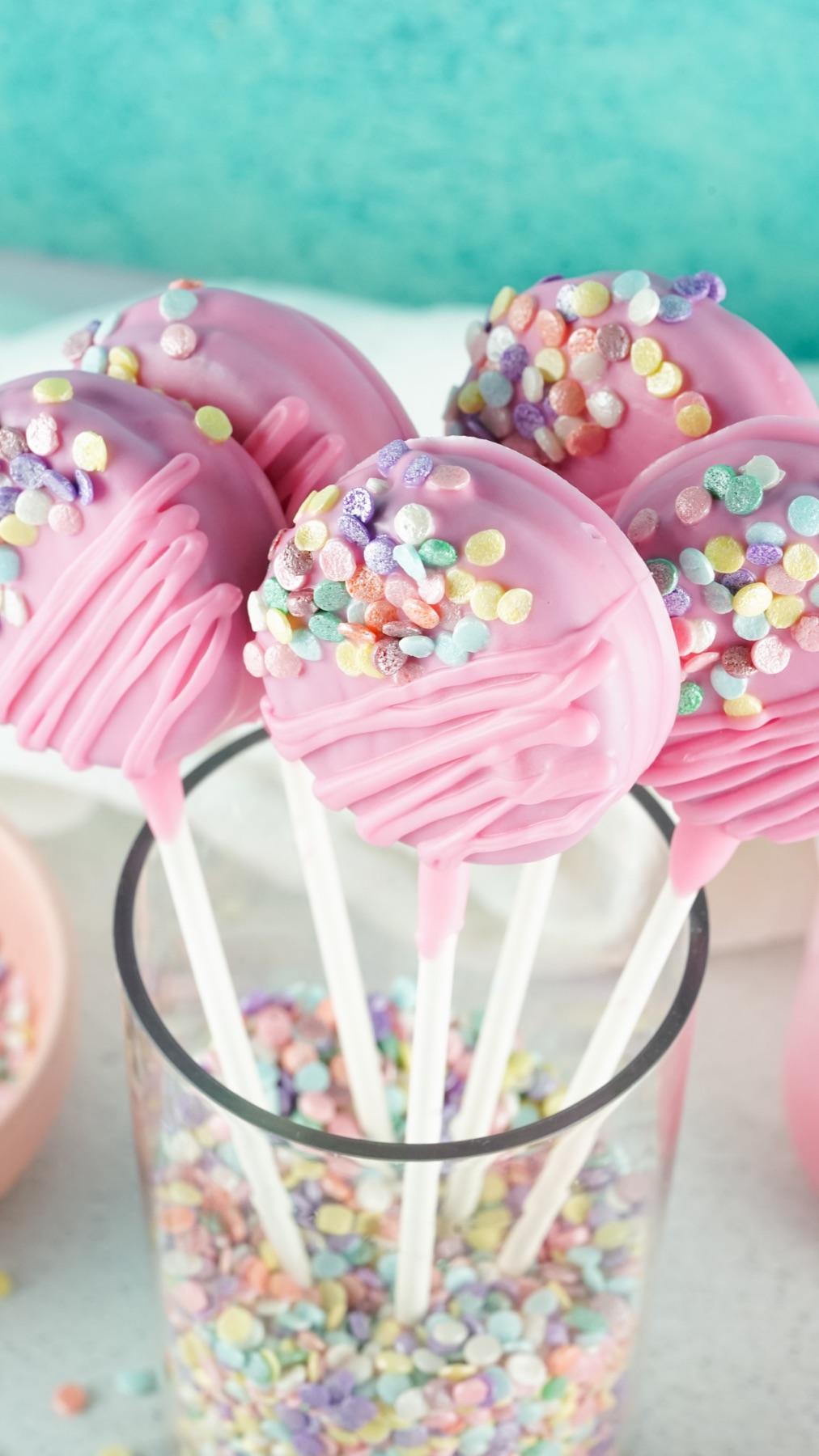 close up of pink valentine oreo pops