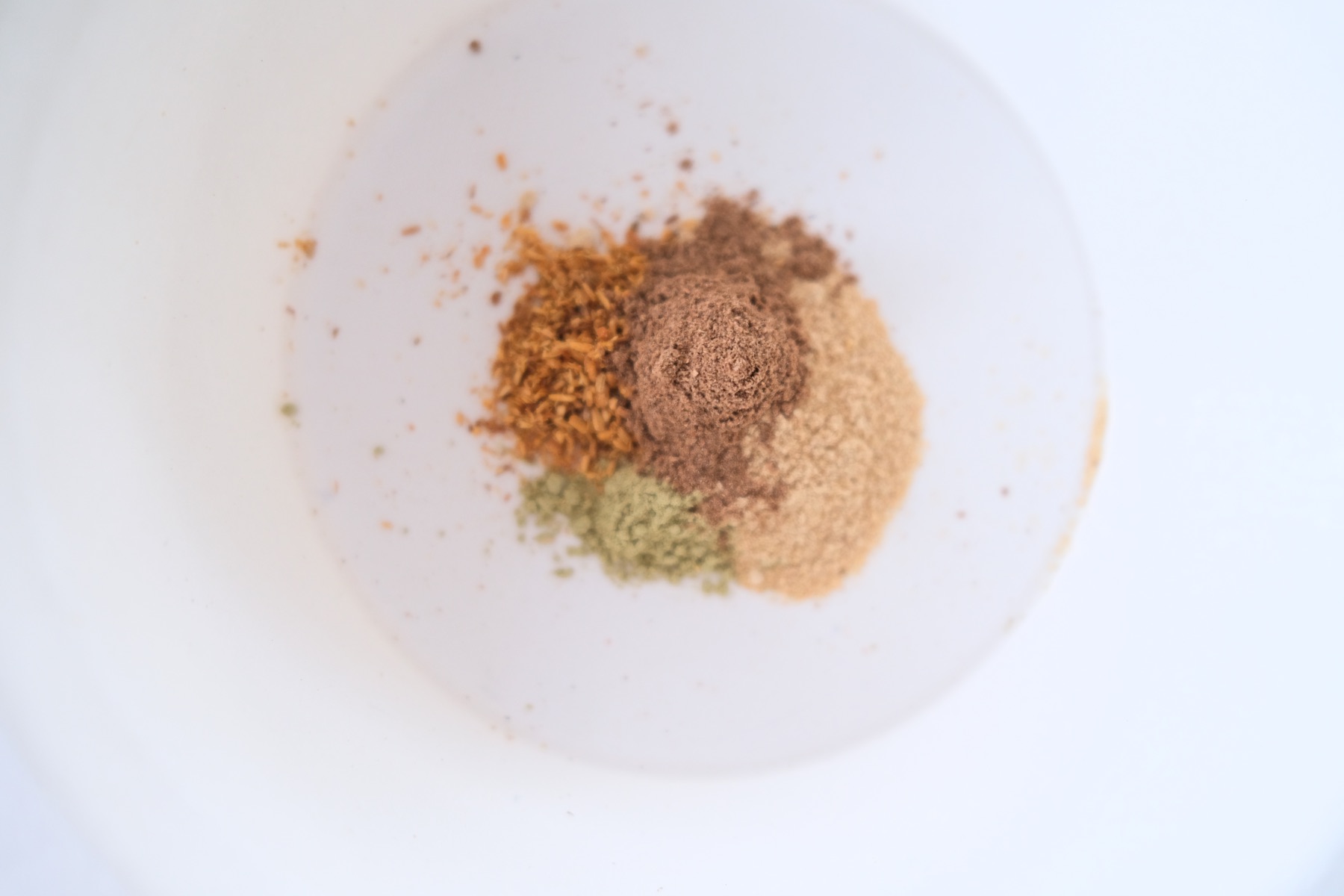 herbs and makko powder blended to make diy incense