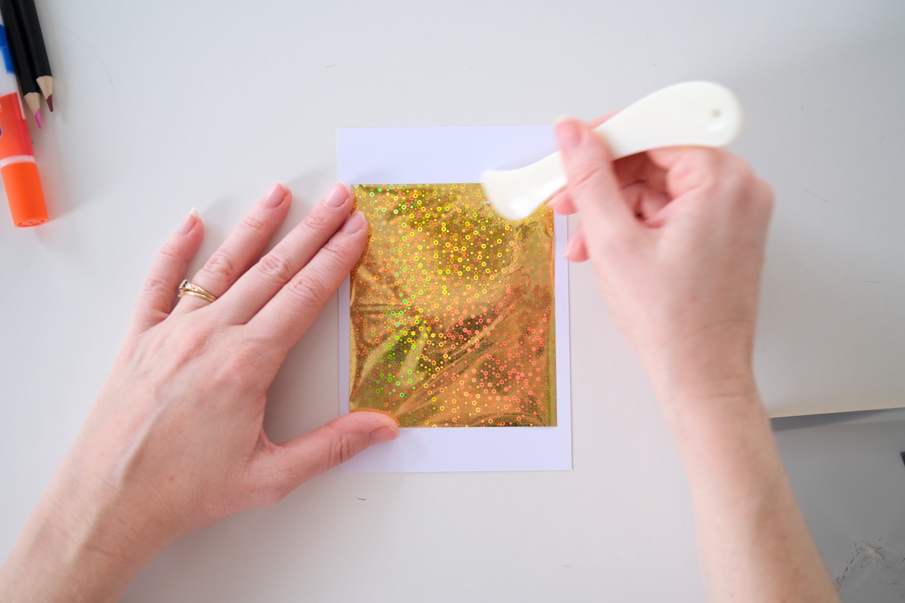 rub the transfer foil evenly and firmly with a bone folder