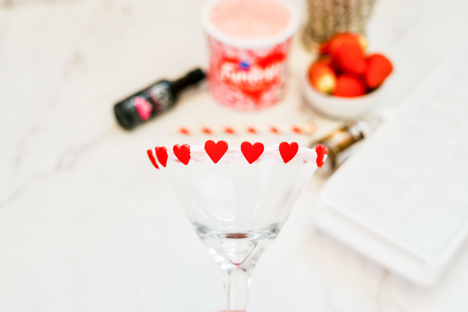 add valentine sprinkles to the glass