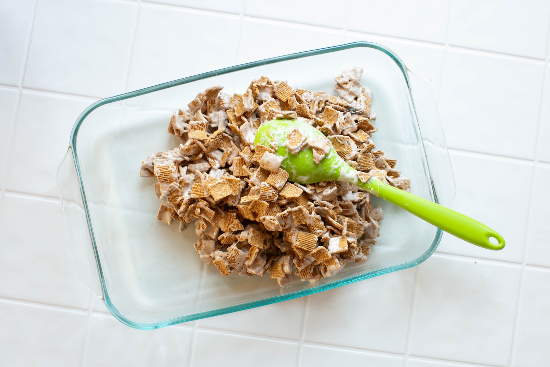 spread the golden graham marshmallow treats in a pan