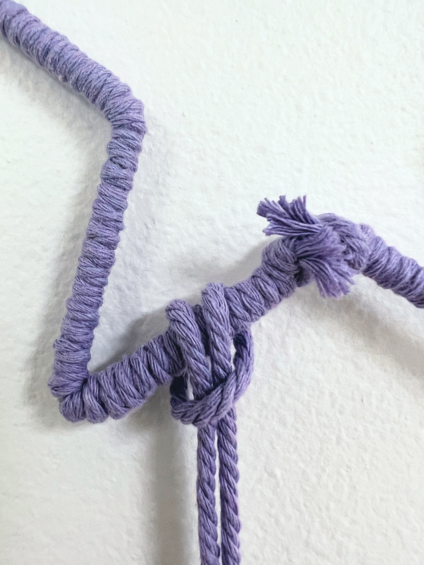 lark's head knot on the star macrame base