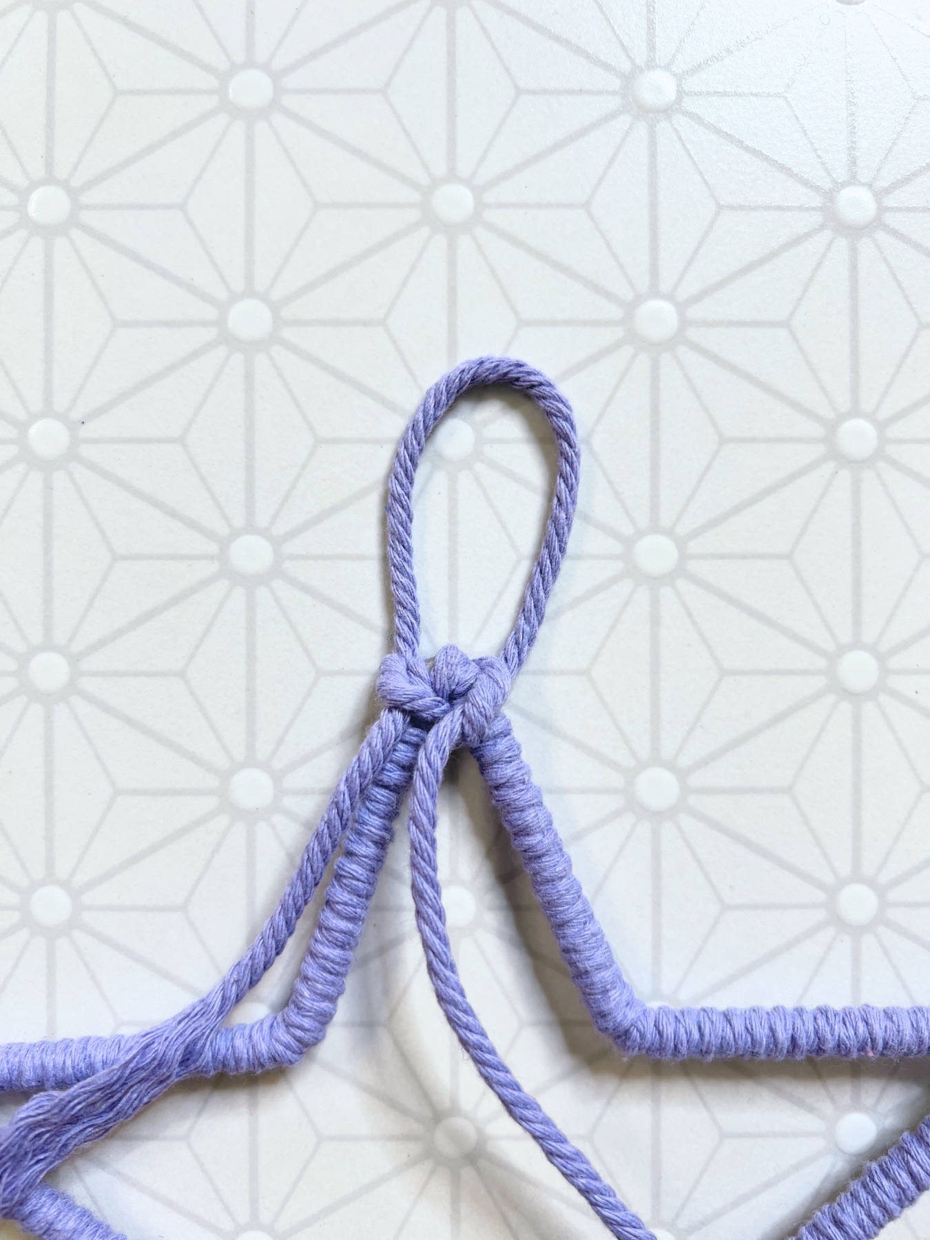 make a hanger at the top of the star macrame base
