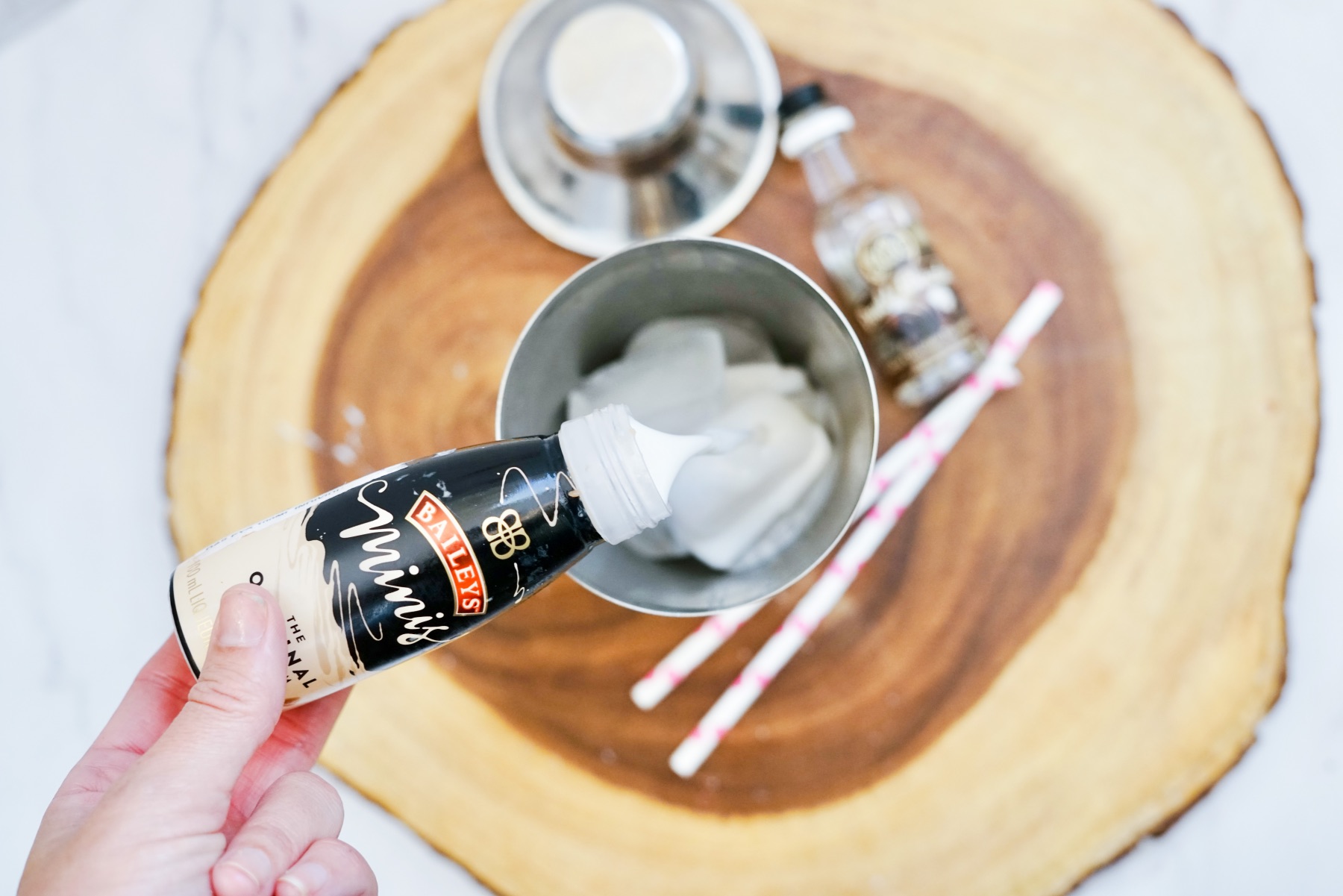 pour baileys into the shaker easter chocolate cocktail