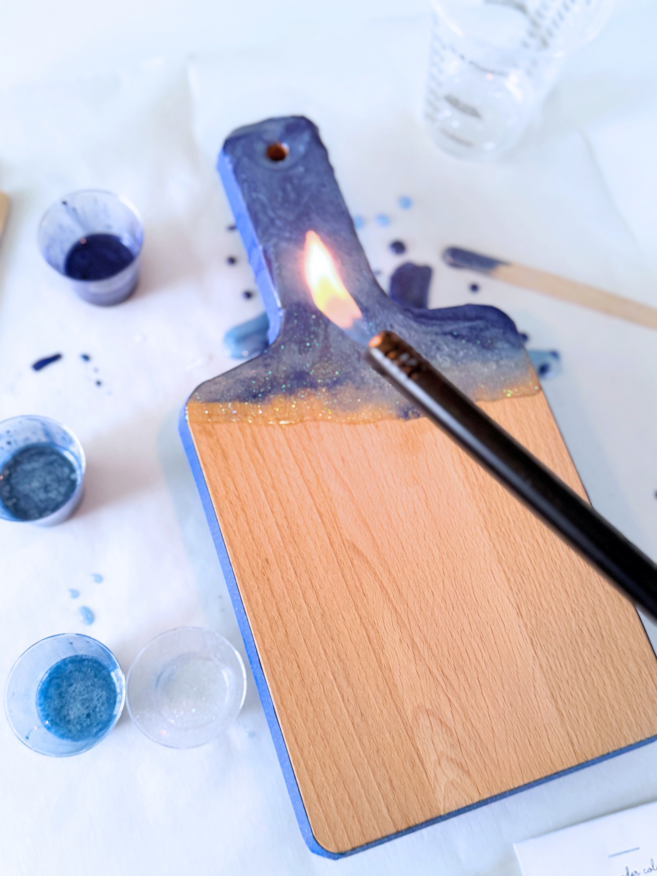 use a flame to remove any air bubbles web