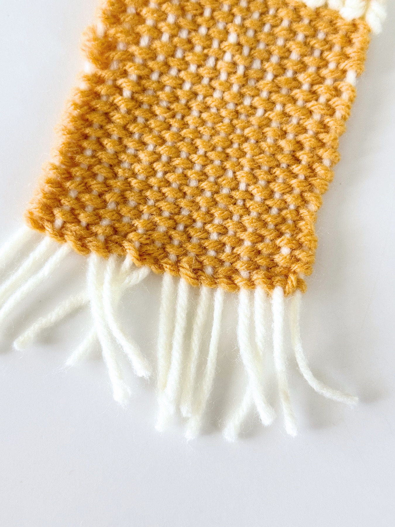 cut the ends to finish the woven coasters web