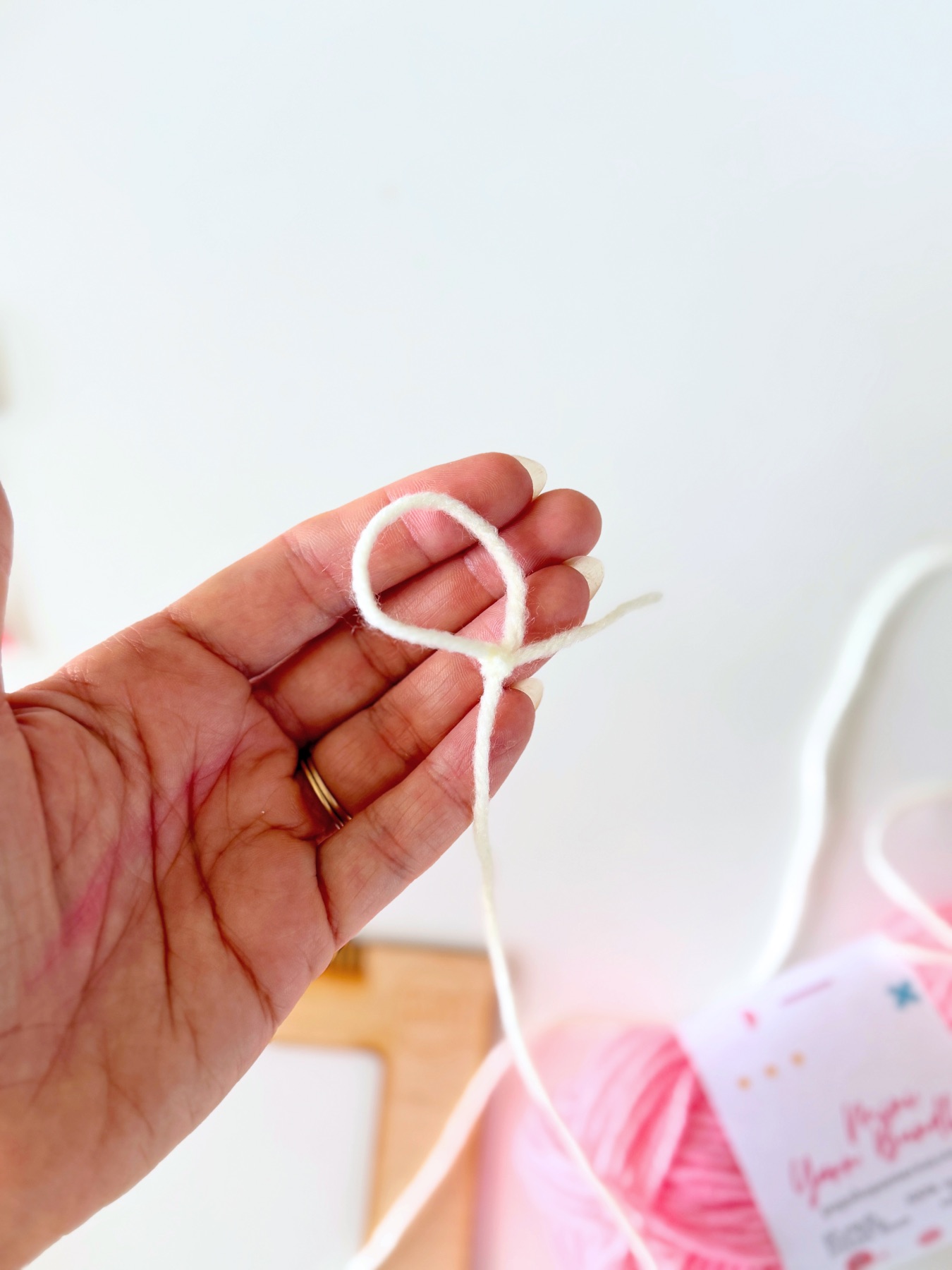 knot the end of the yarn web